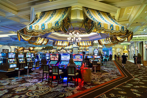 Live croupier handling the roulette wheel